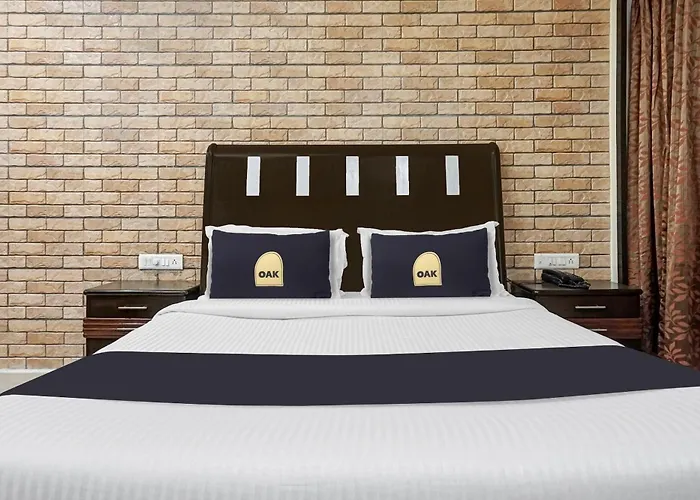 Super Townhouse Oak Gharonda Residency Near Sant Tukaram Nagar Metro Station